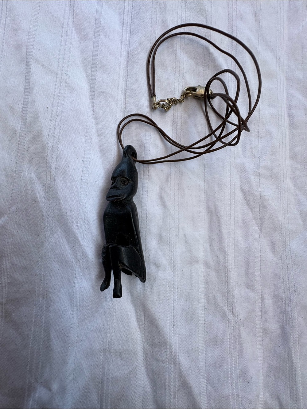 Carved Black Pendant Necklace on Brown Cord